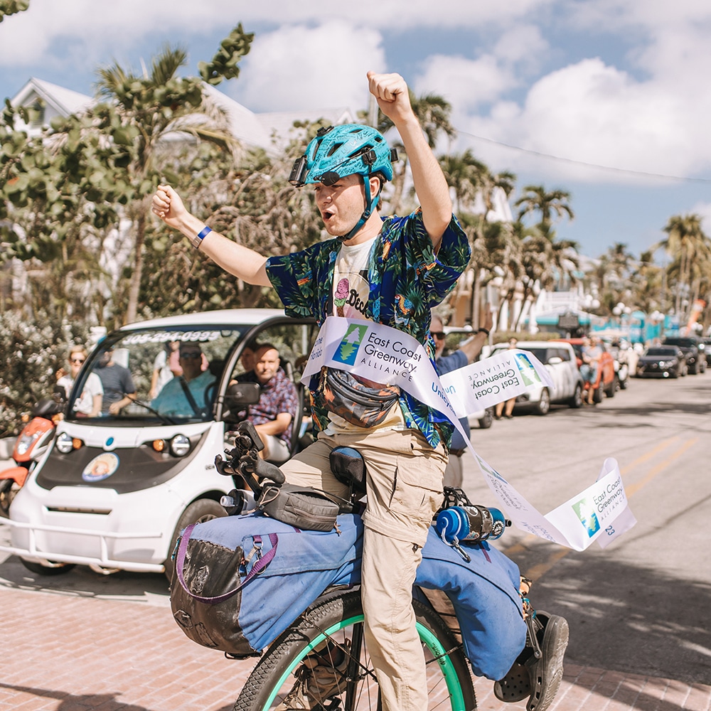 Avery Seuter riding a unicycle in Key West