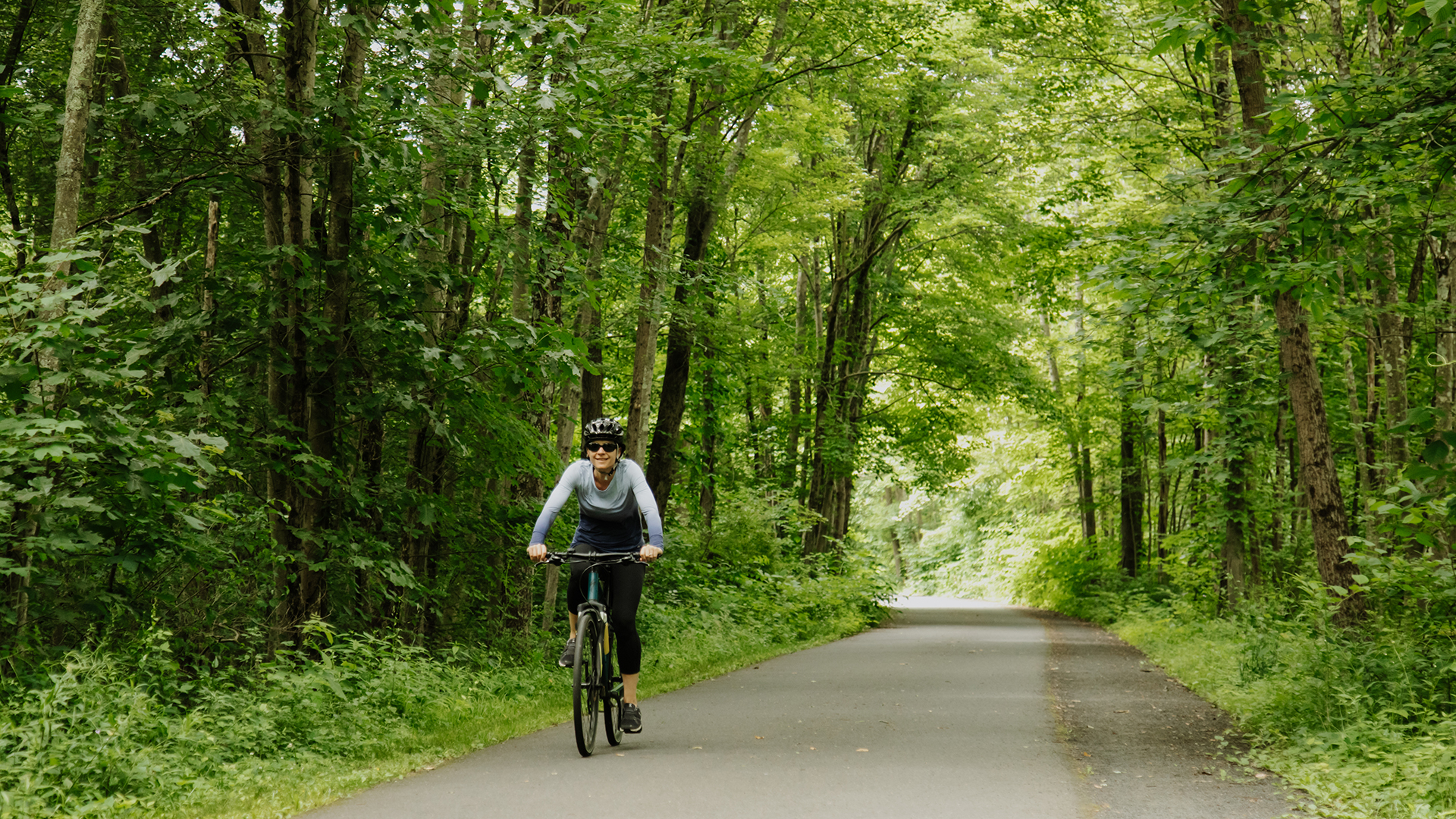 Woman biking in Connecticut