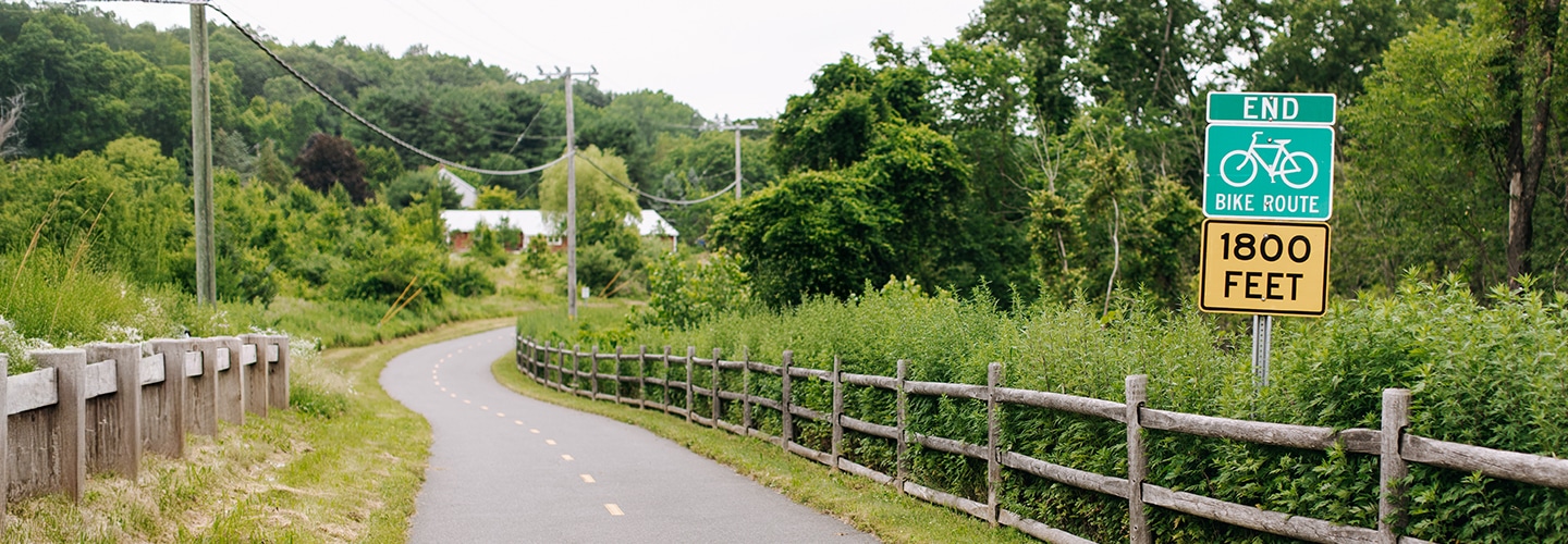 A trail sign displayed next to the Greenway in Connecticut