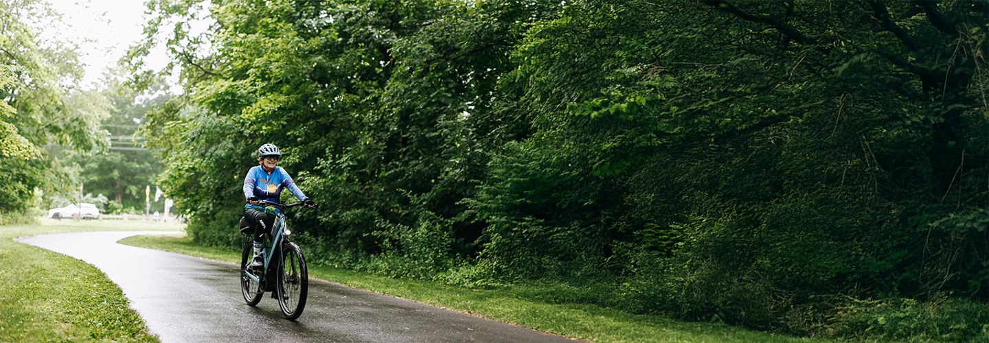 woman riding on a rainy trail in Connecticut during Ride the State