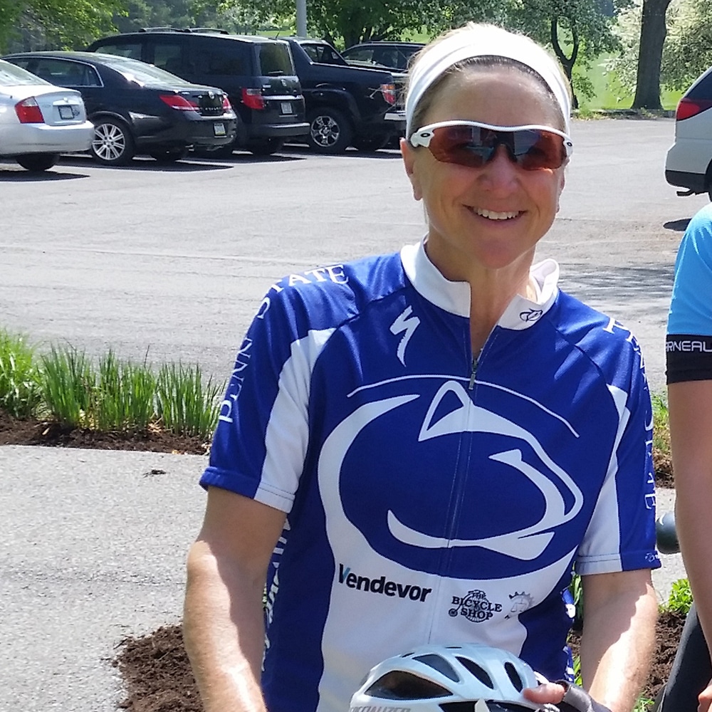 Denise St Pierre in Penn State cycling jersey