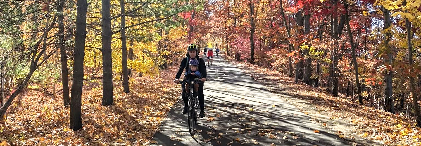 Mother and child biking in Connecticut