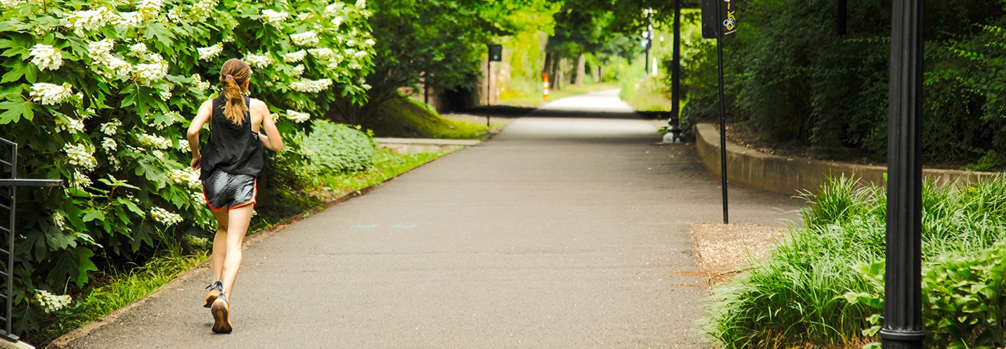Woman running on the Greenway in Connecticut