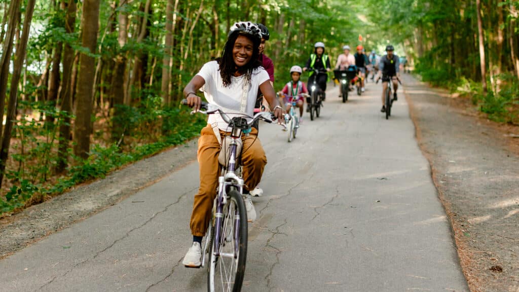 Children biking to school on the Greenway
