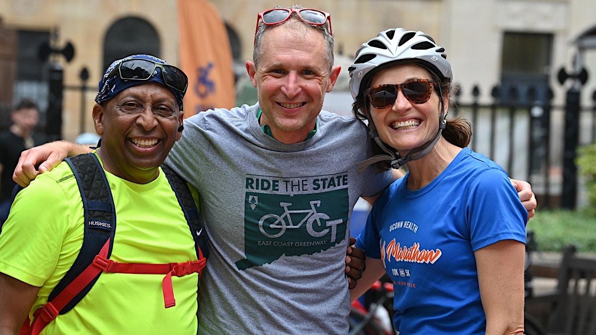 Smiling Ride the State cyclists