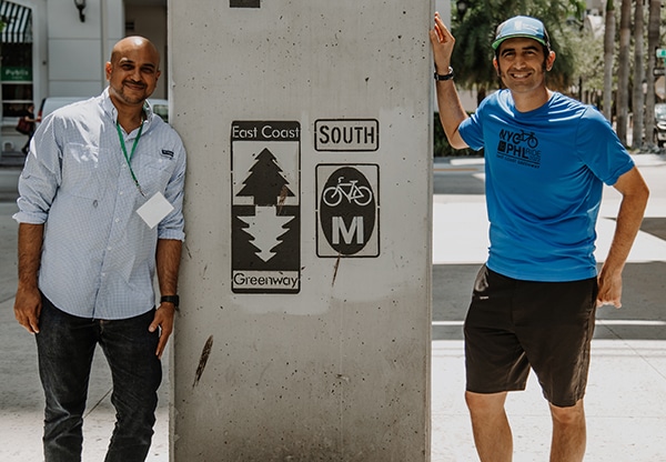 Two men smiling on The Underline trail