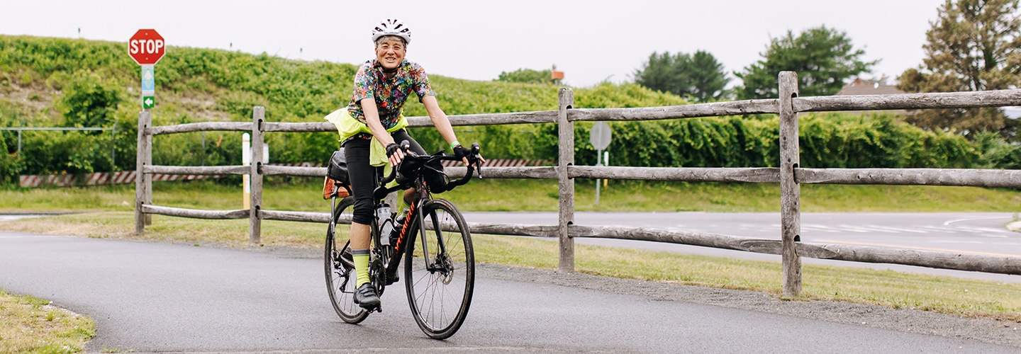 Woman biking in Connecticut
