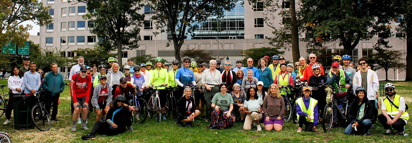 Smiling cyclists and walkers in Philadelphia